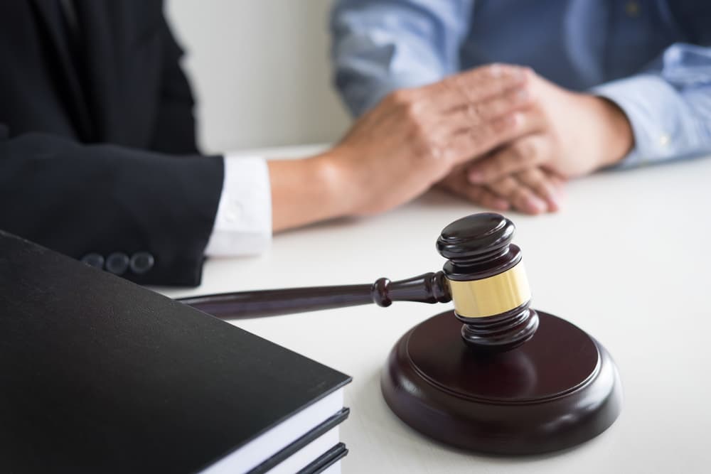 Criminal Defense Lawyer giving advise to a client on expungement of criminal record in Texas