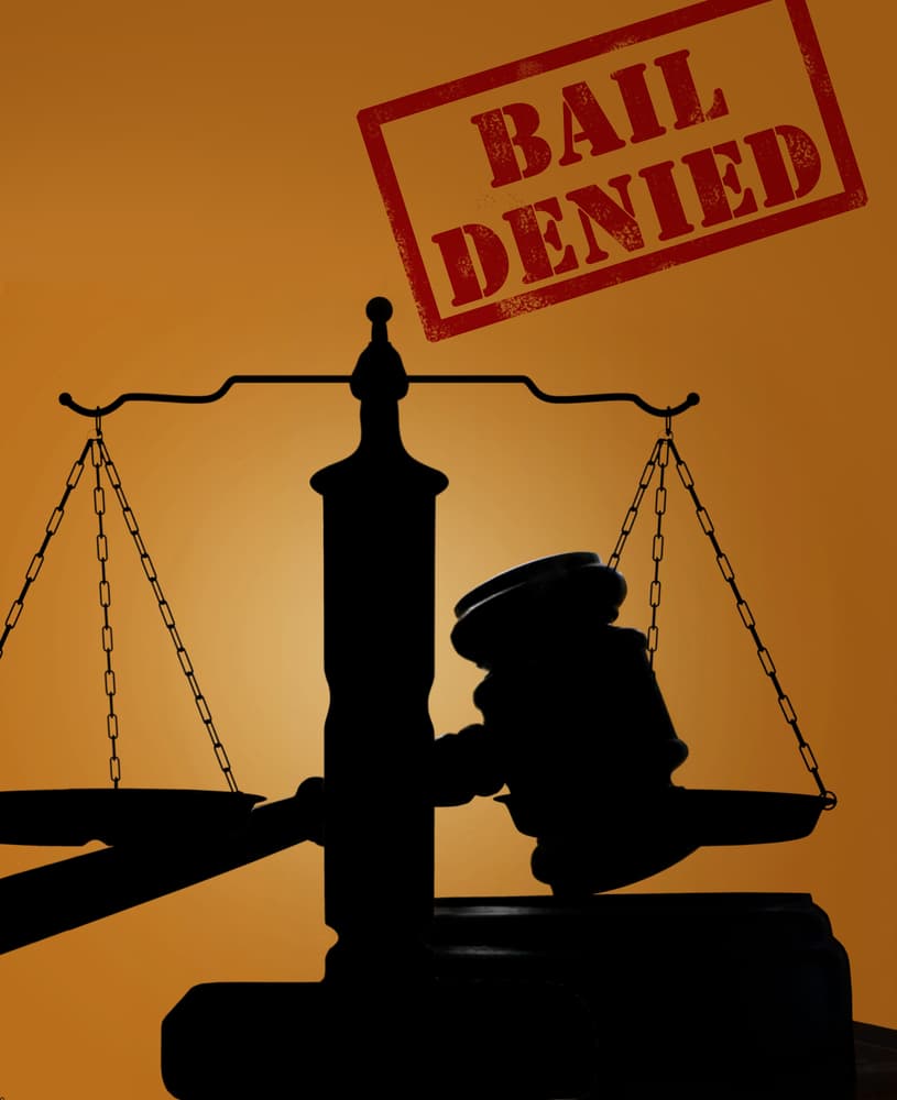 Court gavel and justice scales with Bail Denied text
