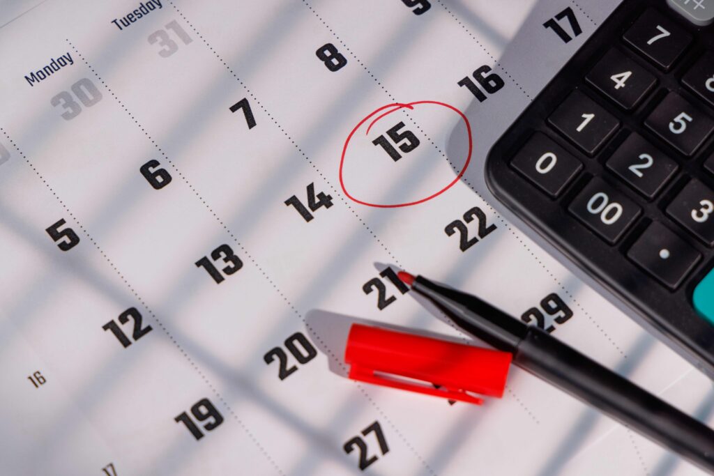 Calendar and paperwork tracking an insurance claim deadline